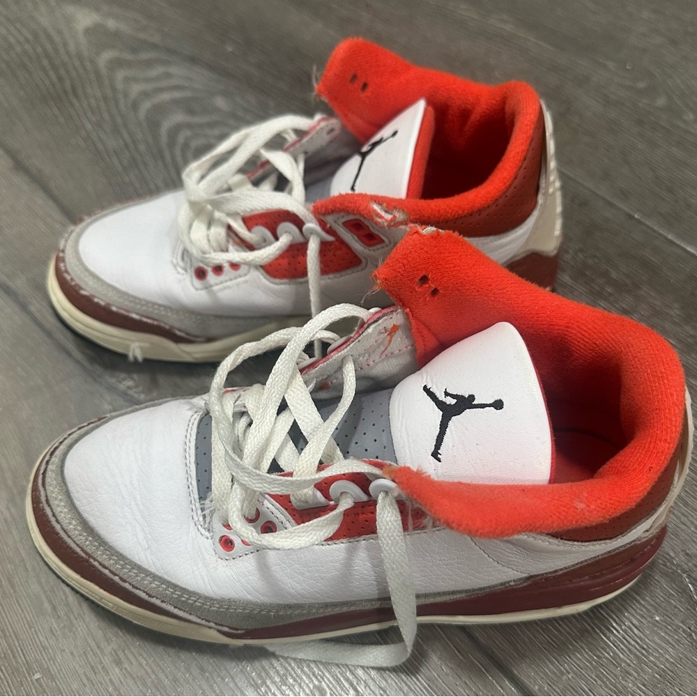 Kids White and Orange Jordan Basketball Sneakers